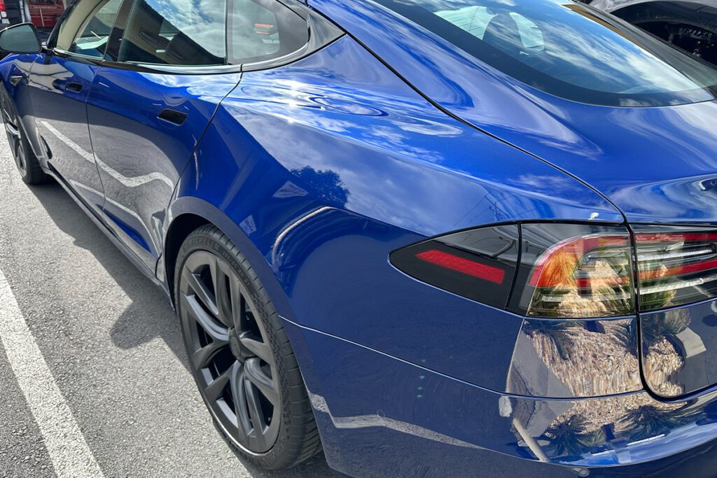 electric vehicle service center blue car